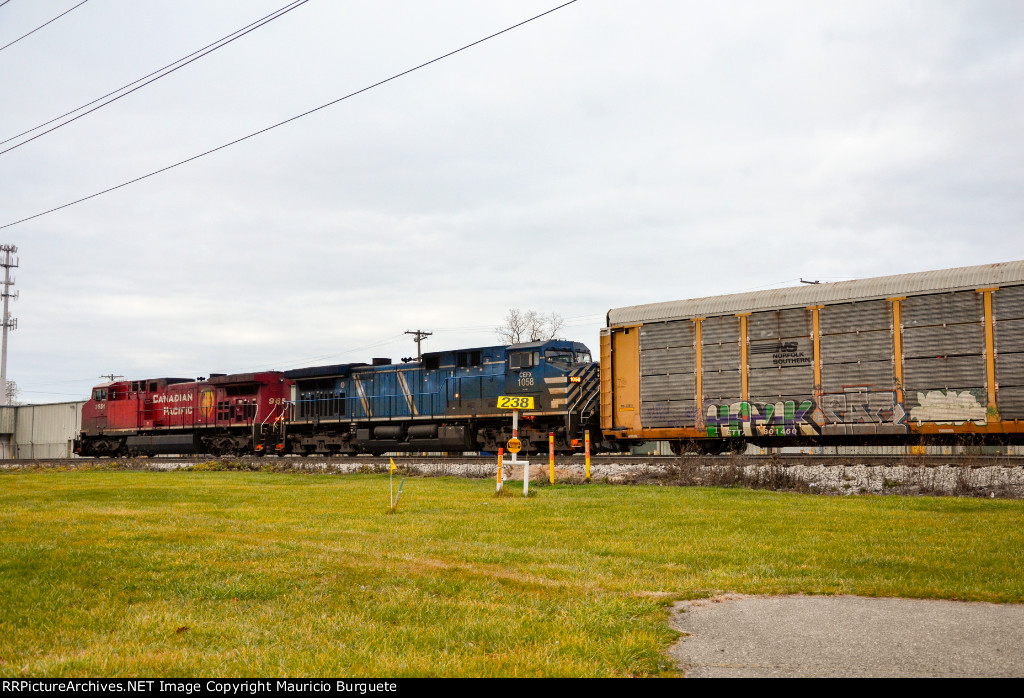 CP + CEFX AC44CW Locomotives leading a train